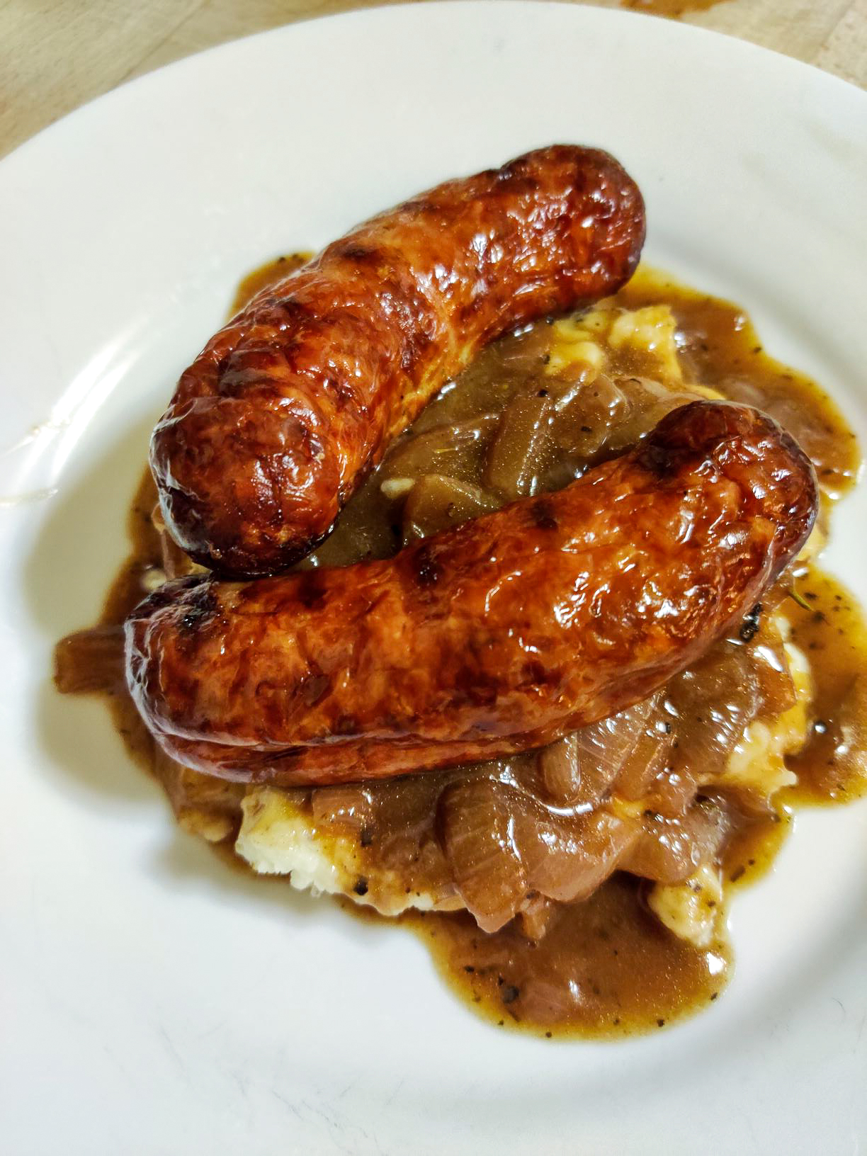 Bangers and Mash with Red Onion Gravy | Eat the Heat